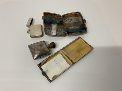 Lot 42 - George silver cigarette case with engine turned decoration, (Birmingham 1924), together with a silver match book holder, (Birmingham 1927), a silver Vesta case (Birmingham 1912) and a white metal s...