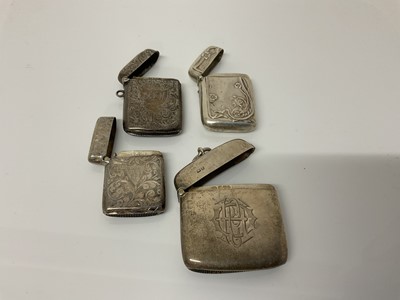 Lot 43 - Victorian silver vesta case with engraved decoration, (Birmingham 1900), together with three other silver Vesta cases (Birmingham 1904, Chester 1902 and another marked Sterling), all at 3.5ozs (4)