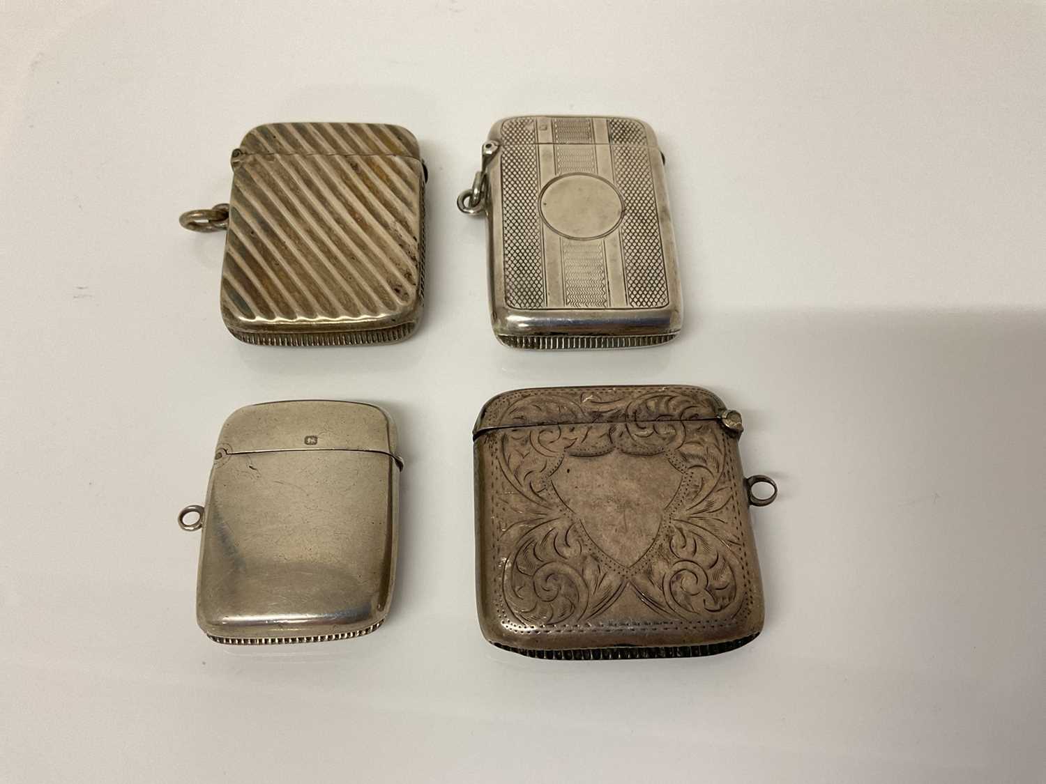 Lot 44 - Victorian silver vesta case, (Birmingham 1892), together with three other silver Vesta cases (Chester 1908, 1918 and Sheffield 1899), all at 3.9ozs (4)