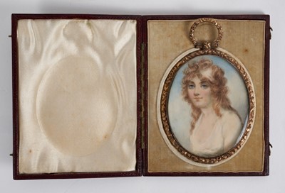 Lot 1017 - Manner of Richard Cosway (1742-1821) miniature watercolour portrait on ivory, depicting a young lady with white dress, apparently unsigned, oval, 6.5 x 5cm, in glazed tooled gilt metal frame with h...