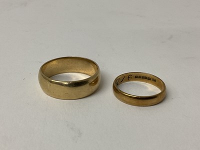 Lot 72 - 9ct gold wedding band, size T 1/2 and another 9ct wedding band, size M (2) 
8.1 grams