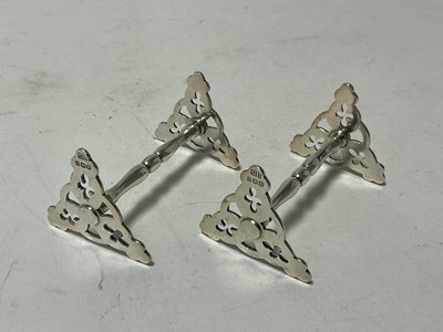 Lot 121 - Pair of silver knife rests with pierced trefoil ends