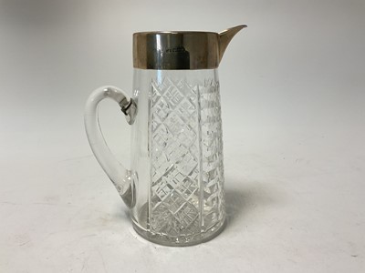 Lot 122 - Victorian silver mounted cut glass lemonade jug of tapered form, (Sheffield 1897), maker Mappin & Webb, 23.5cm in height.