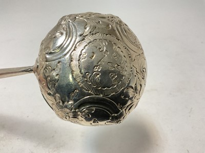 Lot 127 - George III silver toddy ladle, (London 1770), with whale bone handle, 30.5cm in length.