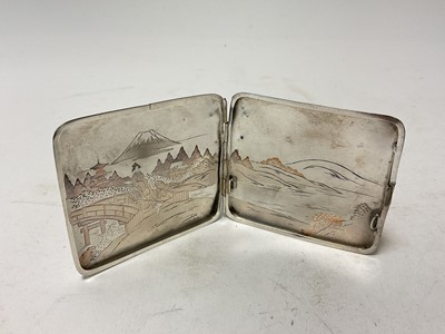 Lot 129 - Early 20th century Japanese silver cigarette case with engraved decoration, marked Sterling to interior, 8.5cm in length.