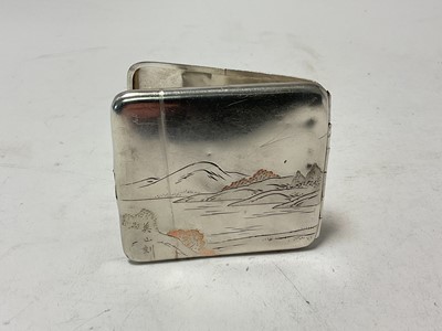 Lot 129 - Early 20th century Japanese silver cigarette case with engraved decoration, marked Sterling to interior, 8.5cm in length.