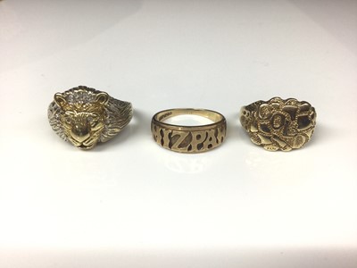 Lot 140 - 9ct yellow and white gold lion mask ring with diamond set eyes and mane, 9ct gold 'Mizpah' ring and one other 9ct gold 'gold' ring