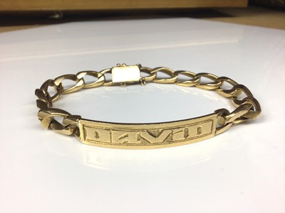 Lot 151 - Eastern yellow metal identity bracelet engraved 'David'