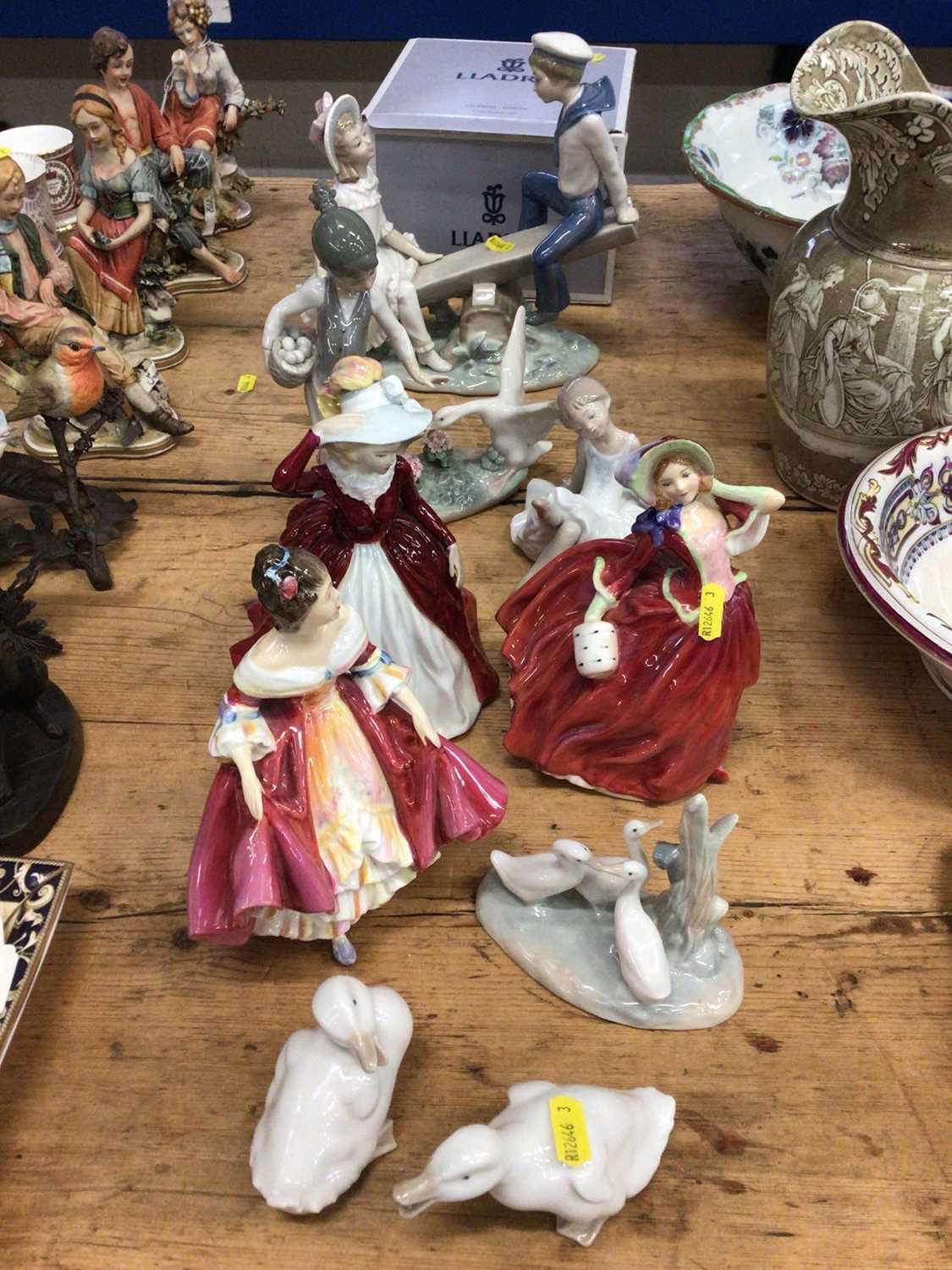 Lot 11 - Three Royal Doulton figures and three pieces of Lladro