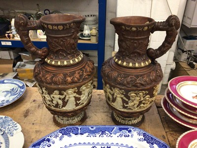 Lot 21 - A large pair of continental terracotta jugs