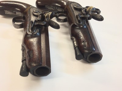 Lot 955 - Pair Early 19th century 16 bore flintlock overcoat pistols