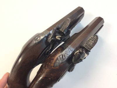 Lot 955 - Pair Early 19th century 16 bore flintlock overcoat pistols