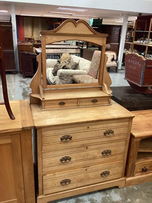 Lot 1034 - Edwardian golden oak dressing chest of three long drawers with raised mirror back containing a further two drawers.