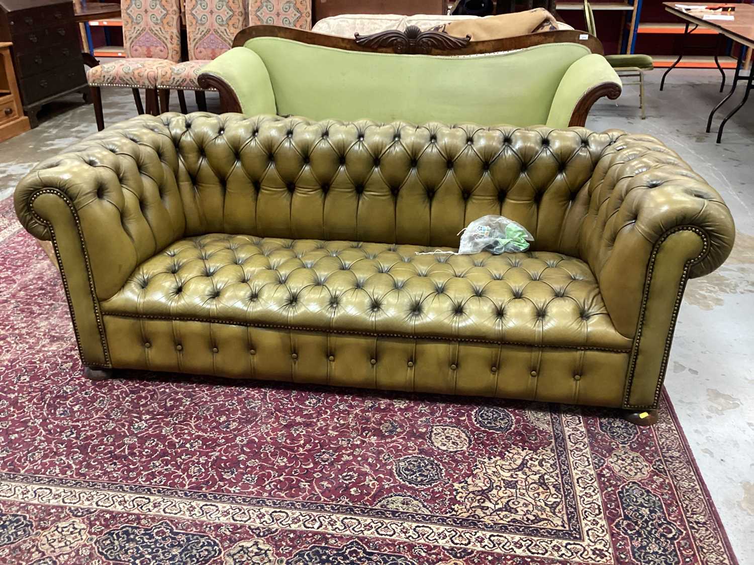 Lot 1032 - Button upholstered chesterfield sofa