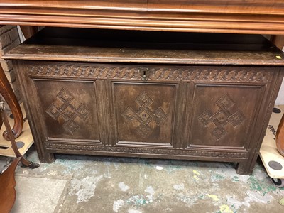 Lot 1124 - 17th century carved oak coffer