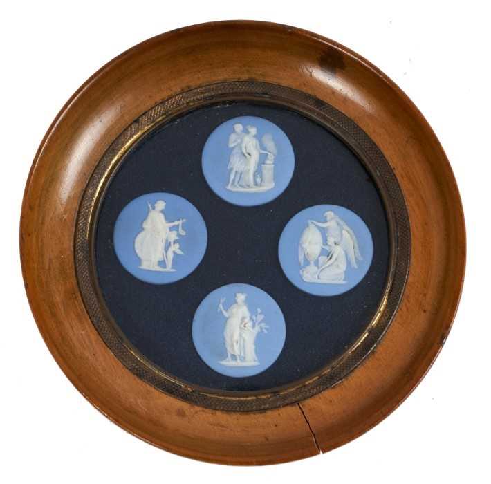 Lot 719 - Framed set of four Wedgwood jasperware plaques