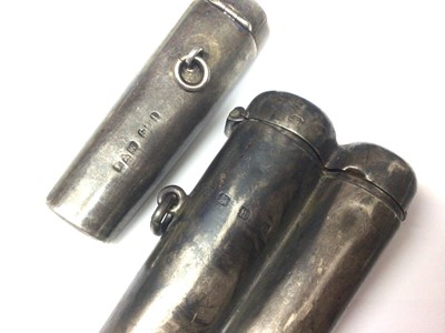 Lot 161 - Victorian silver double cheroot holder and one single silver cheroot holder, both containing amber cheroots