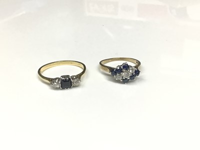 Lot 169 - 18ct gold diamond and sapphire three stone ring, together with 9ct gold diamond and synthetic blue stone cluster ring