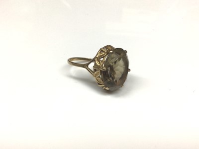 Lot 89 - 9ct gold smoky quartz cocktail ring