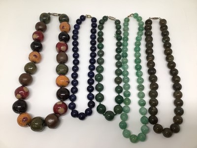 Lot 1021 - Five semi precious polished stone necklaces