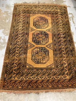 Lot 1237 - Large Pakistani Tekke rug on gold ground