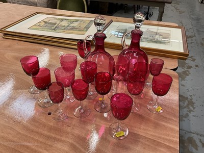 Lot 391 - Group of Victorian cranberry glass to include two decanters and 15 wine glasses.