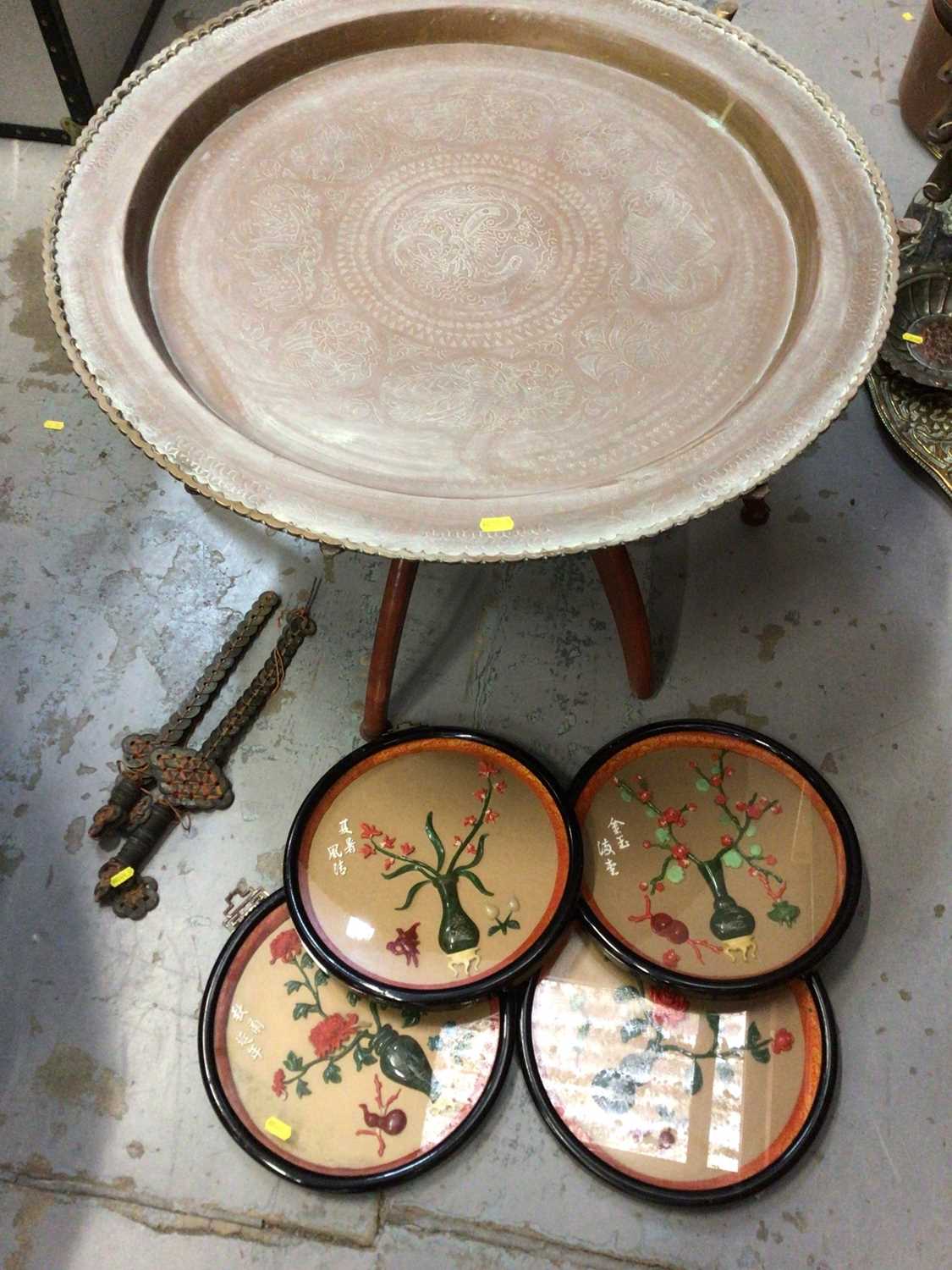 Lot 683 - Set of four Chinese wall plaques depicting the Four Seasons, two Chinese money swords and a Chinese brass tray on folding stand