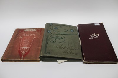 Lot 1405 - Postcards in three albums including Military, greetings, Bonzo, topography, GB and foreign plus photographs.