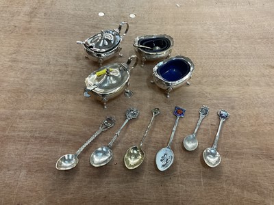 Lot 379 - Silver plated tray, pair of silver plated candlesticks, group of silver cruets abd various souvenir spoons