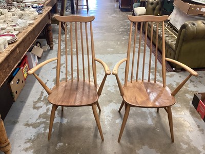 Lot 1117 - Pair of Ercol carver chairs and an Ercol wall shelf (3)