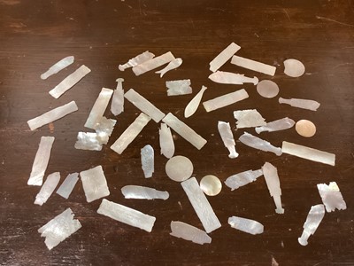 Lot 68 - Collection of bone and mother of pearl gaming counters including fish