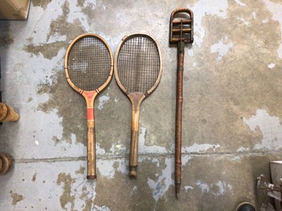 Lot 46 - Shooting stick, fishtail tennis racket and one other tennis racket (3)