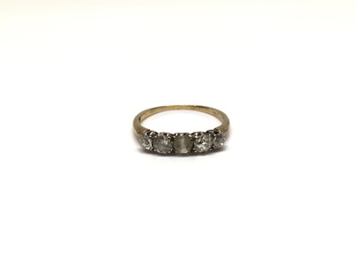 Lot 28 - 18ct gold diamond five stone ring (one stone replaced)