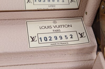 Lot 2089 - Louis Vuitton vanity case with fitted interior, signature monogrammed and brass fittings, together with a Louis Vuitton purse and Louis Vuitton key fob with two keys, label numbered 1029952, lock a...