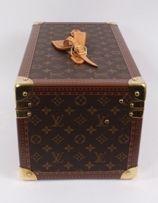 Lot 2089 - Louis Vuitton vanity case with fitted interior, signature monogrammed and brass fittings, together with a Louis Vuitton purse and Louis Vuitton key fob with two keys, label numbered 1029952, lock a...
