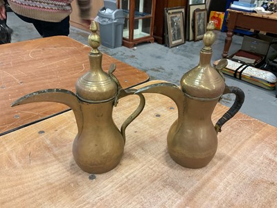 Lot 404 - Pair of brass Dallah Islamic coffee pots (signed)