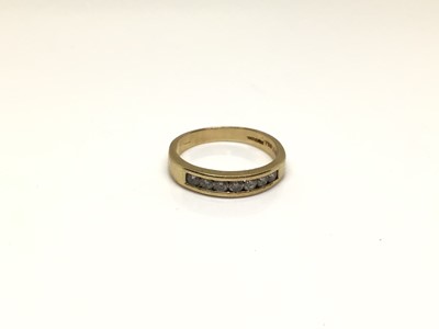 Lot 179 - 18ct gold diamond seven stone half eternity ring