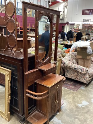 Lot 1039 - Edwardian walnut hall stand with bevelled mirror back, drawer and cupboards below with carved decoration, 94cm wide, 36cm deep, 193cm high