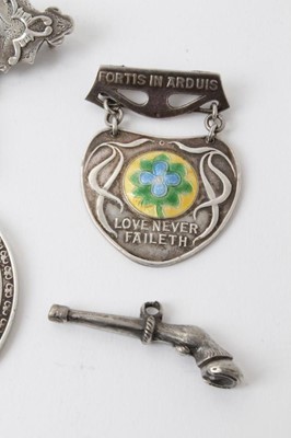 Lot 242 - 1930s silver and enamel Norland Institute medal awarded to Adene Sweet-Escott 1929-1936, three other silver fobs and a brooch