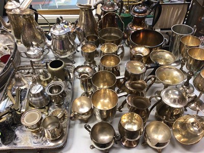 Lot 316 - Quantity of silver plated items including goblets, trays, tea and coffee pots, dishes, ormanets and a glass copper lamp