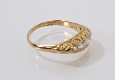 Lot 505 - Edwardian diamond five stone ring with five old cut diamonds in carved gold setting on 18ct gold shank, London 1905.