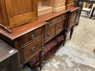 Lot 1051 - Late Regency mahogany inverted breakfront sideboard with an arrangement of drawers and cupboards on receded turned legs, 183.5cm wide, 60cm deep, 94cm high