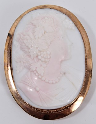 Lot 501 - Five cameo brooches to include a lava cameo in gold and diamond set mount, and three gold mounted Italian carved shell cameos (5)