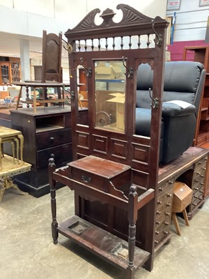 Lot 1052 - Edwardian walnut hallstand with bevelled mirror back, drawer and stick trays below, 95cm wide, 34cm deep, 209cm high