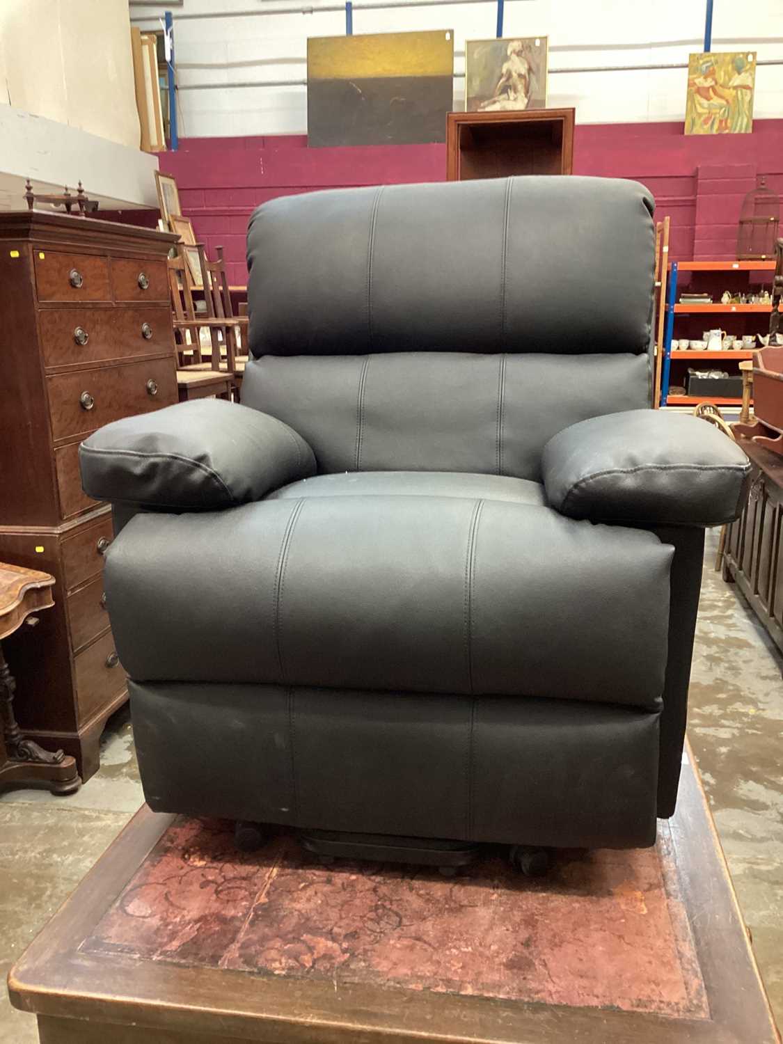Lot 1054 - Contemporary black leather Restwell electric reclining armchair