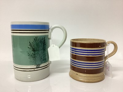 Lot 1196 - Two antique mocha ware type mugs