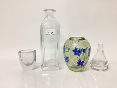 Lot 1197 - Orrefors glass decanter designed by Edgar Hall H2498M, Afors glass spill vase designed by E Gordon, Strombergshyttan glass vase and a vase glass vase with flowers (4)