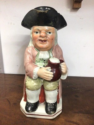 Lot 326 - 19th century Staffordshire pottery Toby jug with lid