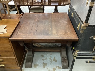 Lot 1060 - 1930's oak draw leaf dining table on bulbous cup and cover supports, 93cm x 91cm closed, 153cm extended