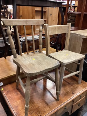 Lot 1063 - Two pine children's chairs together with a pine corner cupboard (3)